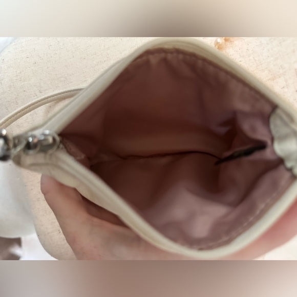 COACH!! Signature C’s Perforation Wristlet Parchment White - Picture 3 of 6